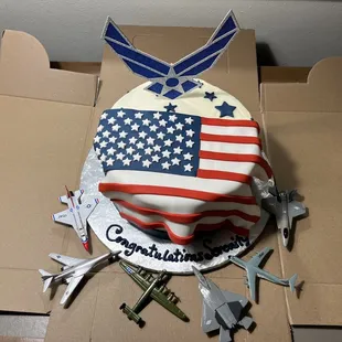 Cake with script written directly on cardboard base.