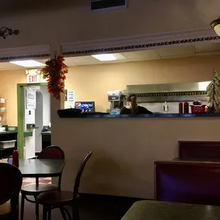 a view of the kitchen from the dining room