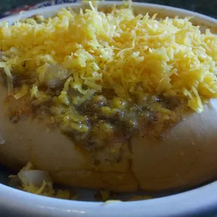 They serve single coneys in a bowl.  Very messy!