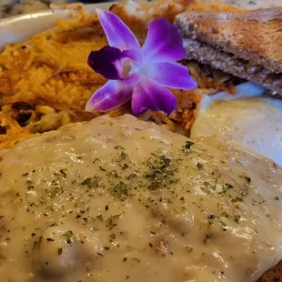 Country fried steak and eggs.
