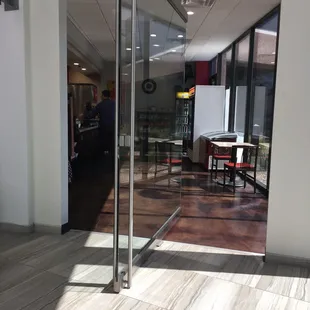 a view of the restaurant through the glass door