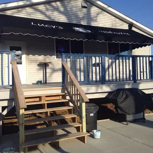 the front porch of her house