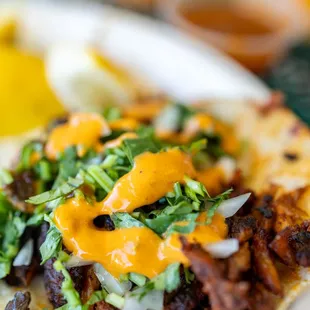 Al Pastor Street Taco w/ house Orange Sauce ($4.19)