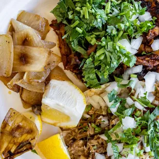 Street Tacos ($4.19/ea) Al Pastor on top and Carnitas beow