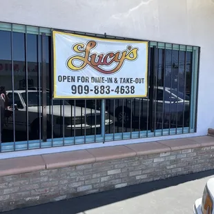 Front banner sign facing parking area