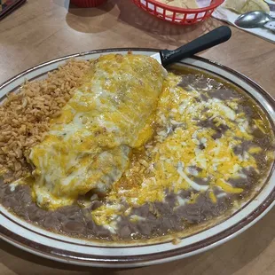 Combination Chile Verde Burrito served with Mexican rice and refried beans