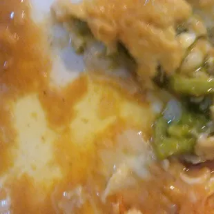 That's all oil. I honestly feel nauseous out. The whole plate was full of cheese. Rice was hard beans not that good.