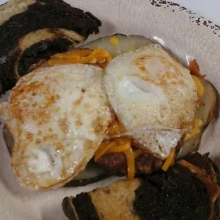 Loaded potato with sausage and eggs
