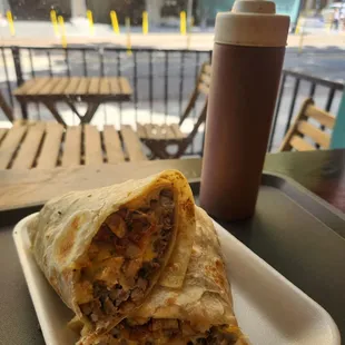 California burrito with red salsa