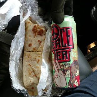 Sausage, egg cheese burrito. Can for comparison. Giagante Burritos.