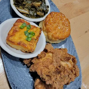 Fried chicken (dark meat), biscuit, mac and cheese, and collard greens.