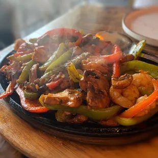 Shrimp in ghee and garlic  sautéed red and green peppers