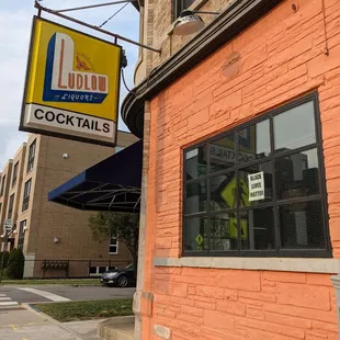 a sign for ludlow&apos;s cocktails