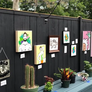 Patio featuring &quot;Dope Art Show&quot; with art by TotesFerosh, Little Creeps, and Penny Pinch