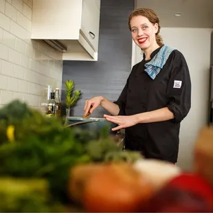 a woman in a kitchen