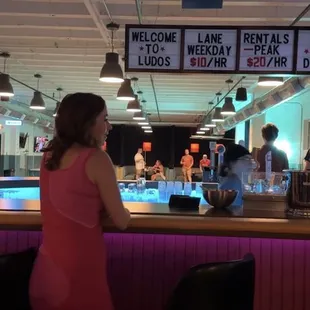 a woman in a pink dress