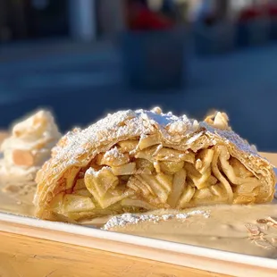 COVID OUTDOOR DINING: Apple Strudel w/ spiced apple filling, rum-soaked raisins, almonds, vanilla sauce | $10 (GET THIS!)