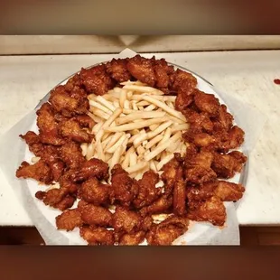 Chicken wing with fries the tray