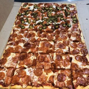 Fiesta pizza pepperoni half jalapeños