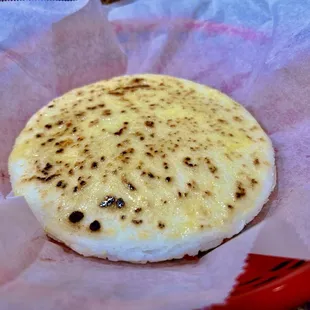 Arepa, light- buttery. Fluffy!