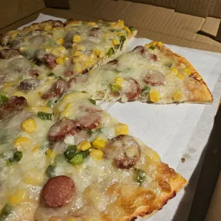 Columbian house pizza.   Does not look like the other pictures and it&apos;s missing some ingredients per the description on the attached menu