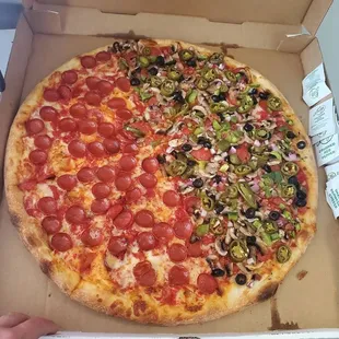 Half supreme and half pepperoni