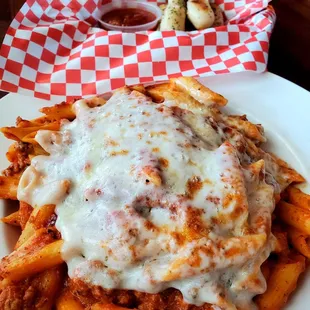 Baked Ziti with Meat Sauce &amp; Breadsticks with Marinara Sauce.