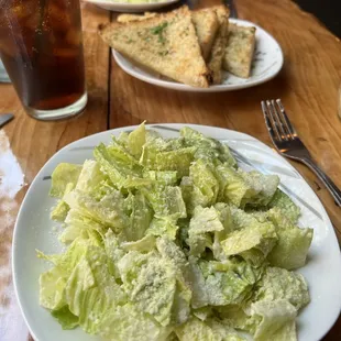 Caesar salad with garlic bread