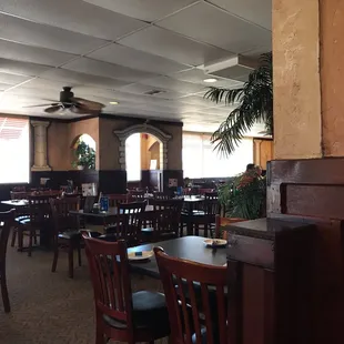 a restaurant with tables and chairs