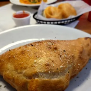 Calzone made with pepperoni and sausage