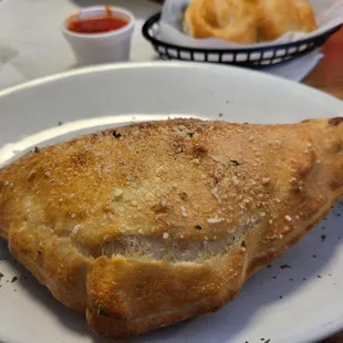 Calzone made with pepperoni and sausage