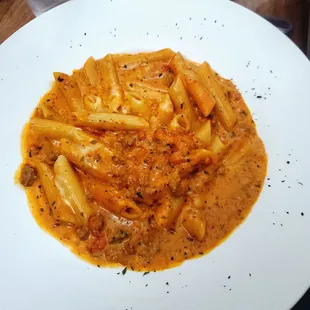 B'ville Special; Penne, Alla Panna sauce, Meat sauce, Mozzarella. Italian fiancé approved