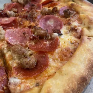 a pepperoni and sausage pizza