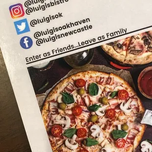 pizzas and drinks on a table