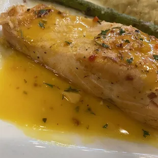 a piece of chicken and asparagus