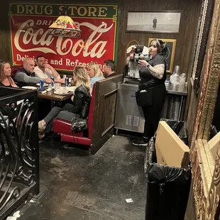 a group of people sitting at a table