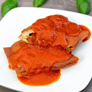 Calzone (sauce is served on the side in to go containers)