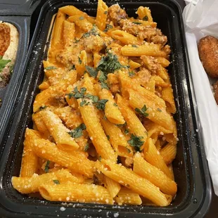 Penne and sausage with pink sauce