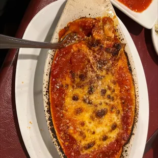 a pizza on a white plate