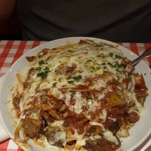 Linguine with meat sauce, Italian sausage and baked cheese...BF told them what he wanted and they made it! Pretty cool!