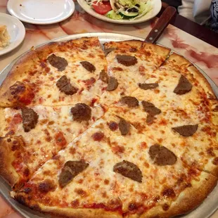 Large meatball pizza.