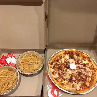 two pizzas and french fries