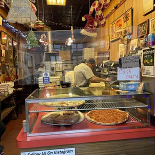 Inside.  Cash only.  And Gio the goat again