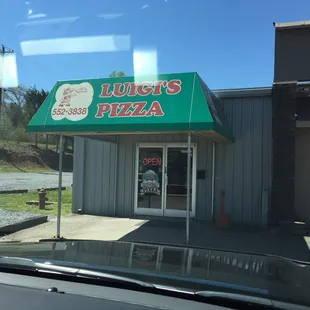 Tucked away in the far left corner. Right next to JC Beauty Mart.