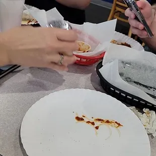 They use old school wax plates. But do have real silverware.