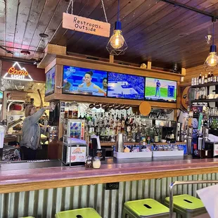 The bar area and kitchen