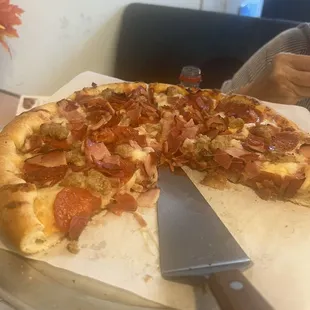 Looked so good that I couldn't wait to dive in.  Picture was taken after we got the full impact of Luigi's delicious meat lovers pizza!