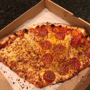 Slice of cheese and a slice of pepperoni