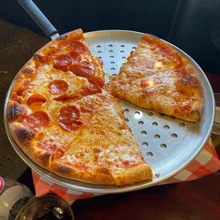 two slices of pepperoni pizza