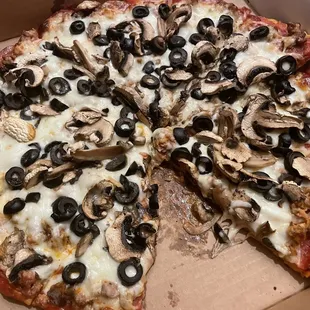 Good pizza toppings, and absolutely awful frozen cardboard pizza crust
